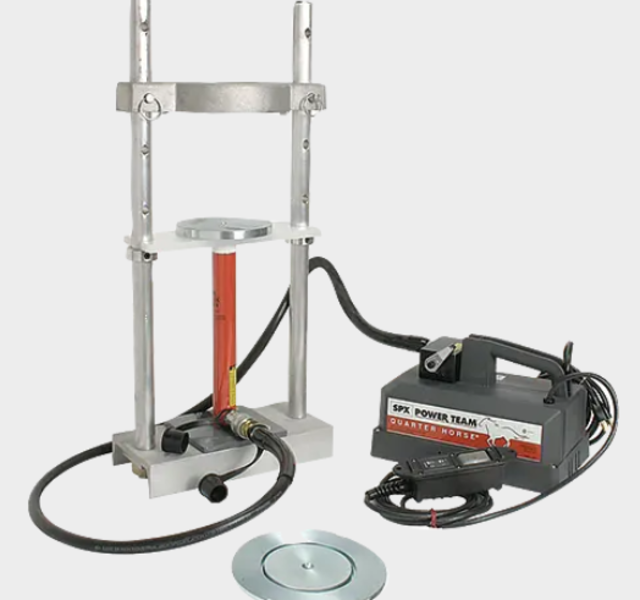 Asphalt Sample Ejector, Motorized Supports the following standards: ASTM D6926, AASHTO T245  This Motorized Marshall Sample Ejector features the use of a 5-ton capacity motorized hydraulic pump and ram assembly. The unit incorporates extended upright
